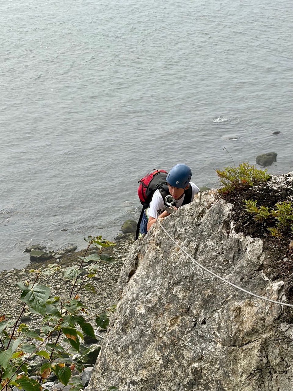 A via ferrata climb along high cliffs near the St. Lawrence River